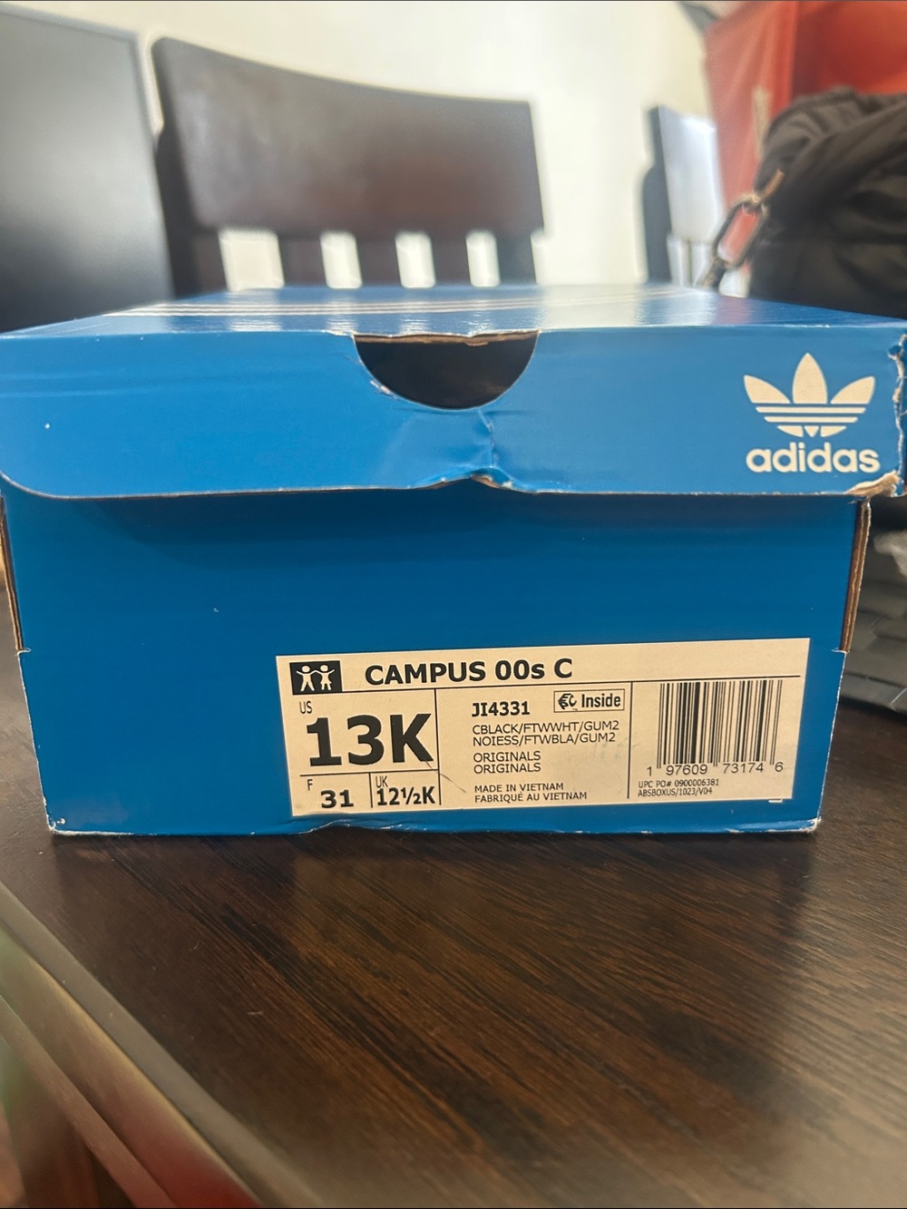 adidas blue shoe box with white trefoil logo